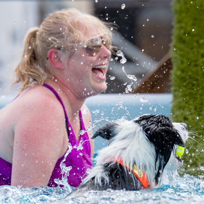 Woman Diving with Dog